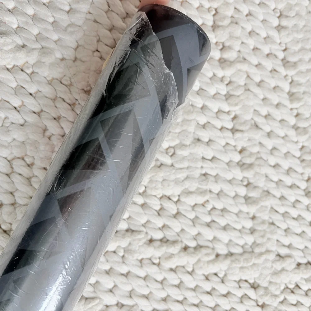YORK WALLCOVERINGS Petite Pivots Roll of Wallpaper Roll 27’ L x 27” W Black Gray